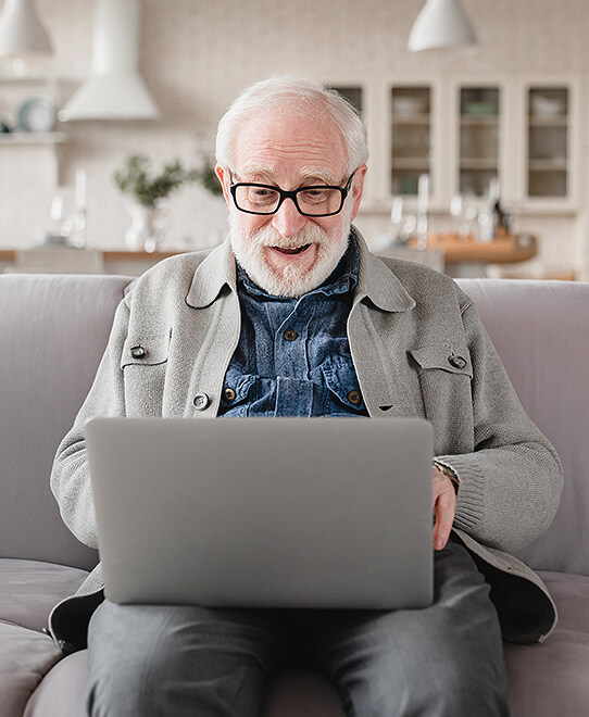 Senior man reading information about living with a stoma